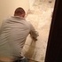 Brian working on our bathroom and kitchen