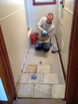 Brian working on our bathroom and kitchen